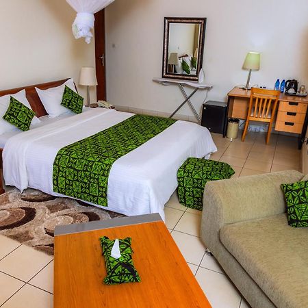 One Click Hotel คิกาลี ภายนอก รูปภาพ