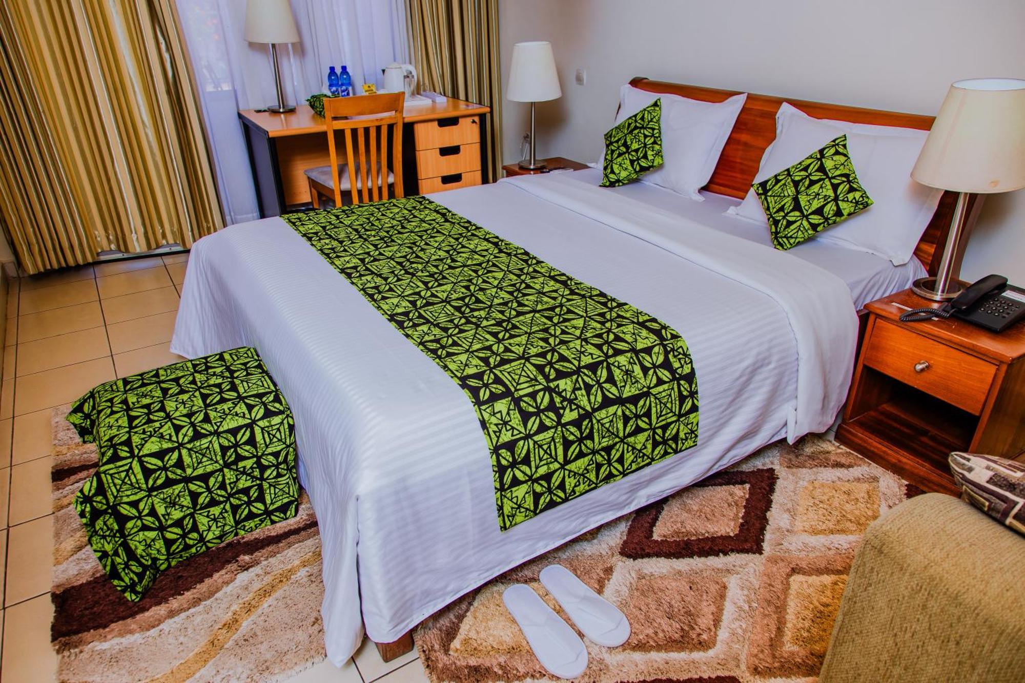 One Click Hotel คิกาลี ภายนอก รูปภาพ